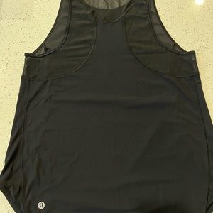Lululemon black mesh tank top size 4 .